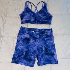 A detailed blue sports bra and biker short set. Cross waist band and straps!✨💙